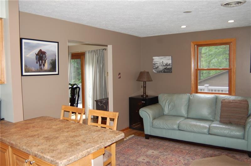 183 Dehaven Road Beaver Falls, PA 15010 - Photo 7 of 23 Seating area connected to kitchen with eat-in counter. Opens to formal dining area.