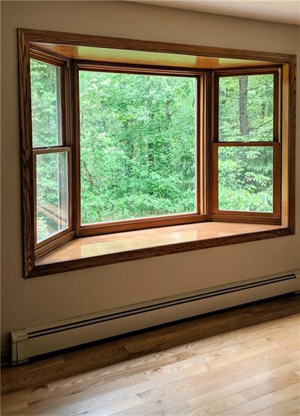 183 Dehaven Road Beaver Falls, PA 15010 - Photo 9 of 23 Formal Living on Main has Bay Window for views across estate's front lawn and wooded area.