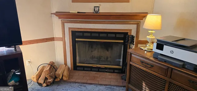 a stove top oven sitting inside of a kitchen