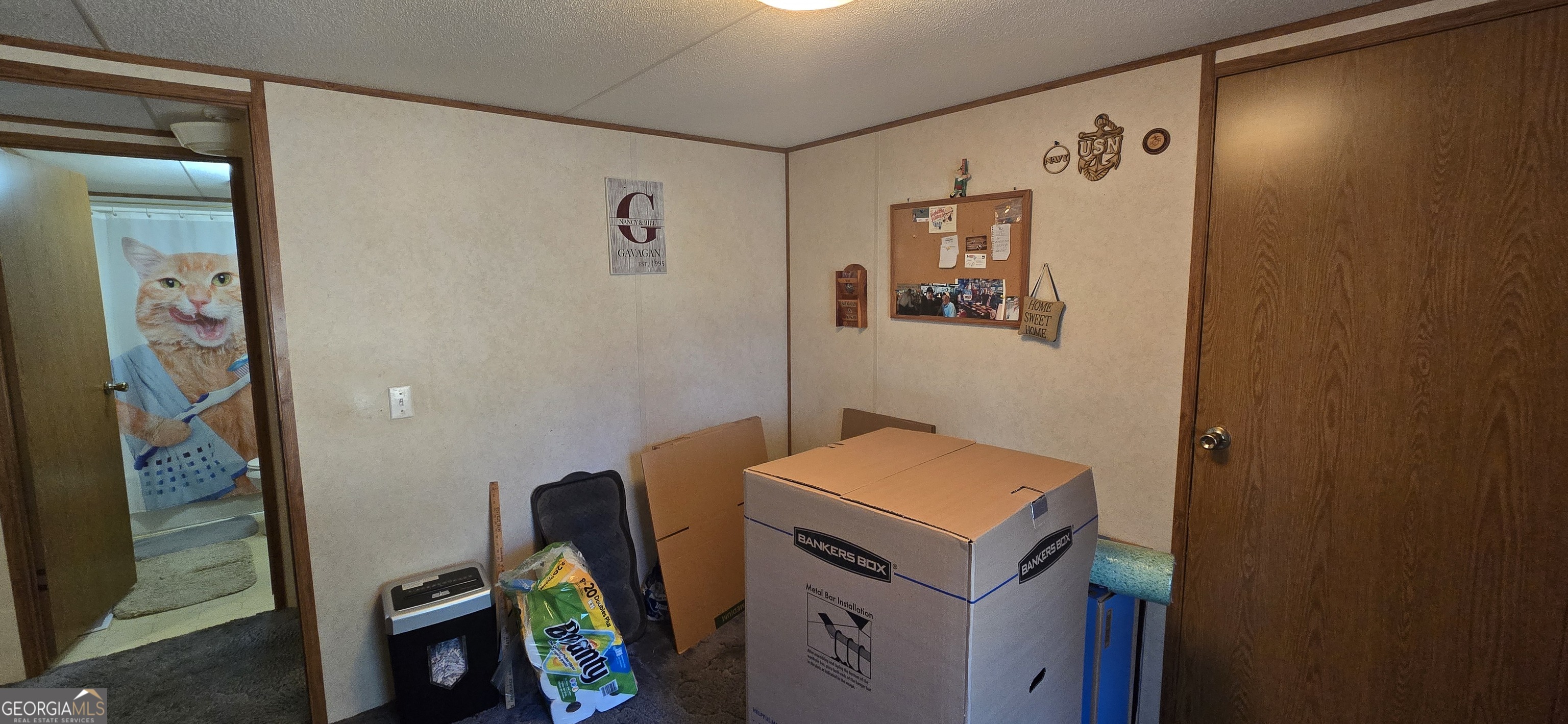 912 Druid Street Dublin, GA 31021 - Photo 25 of 32 a utility room with dryer and washer
