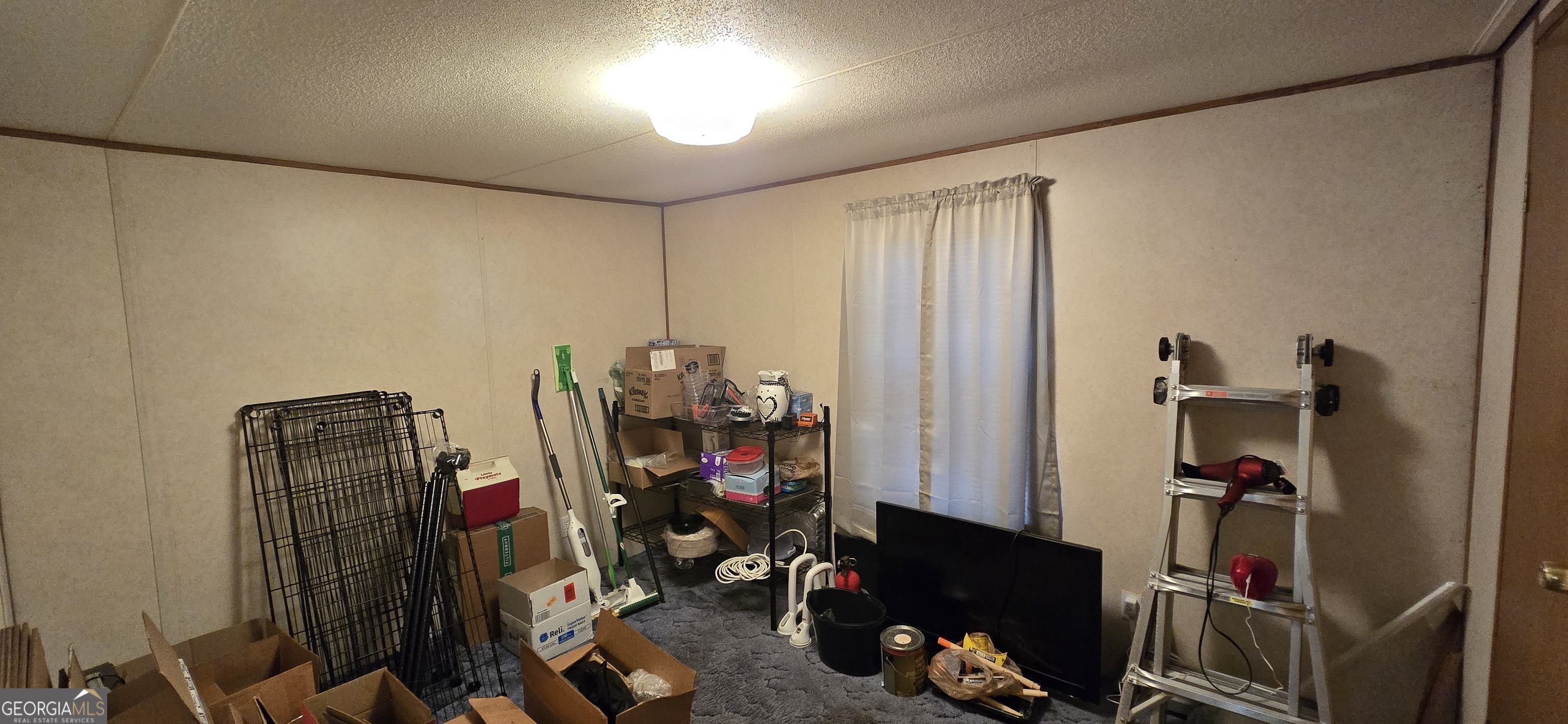 912 Druid Street Dublin, GA 31021 - Photo 28 of 32 a view of a room with gym equipment