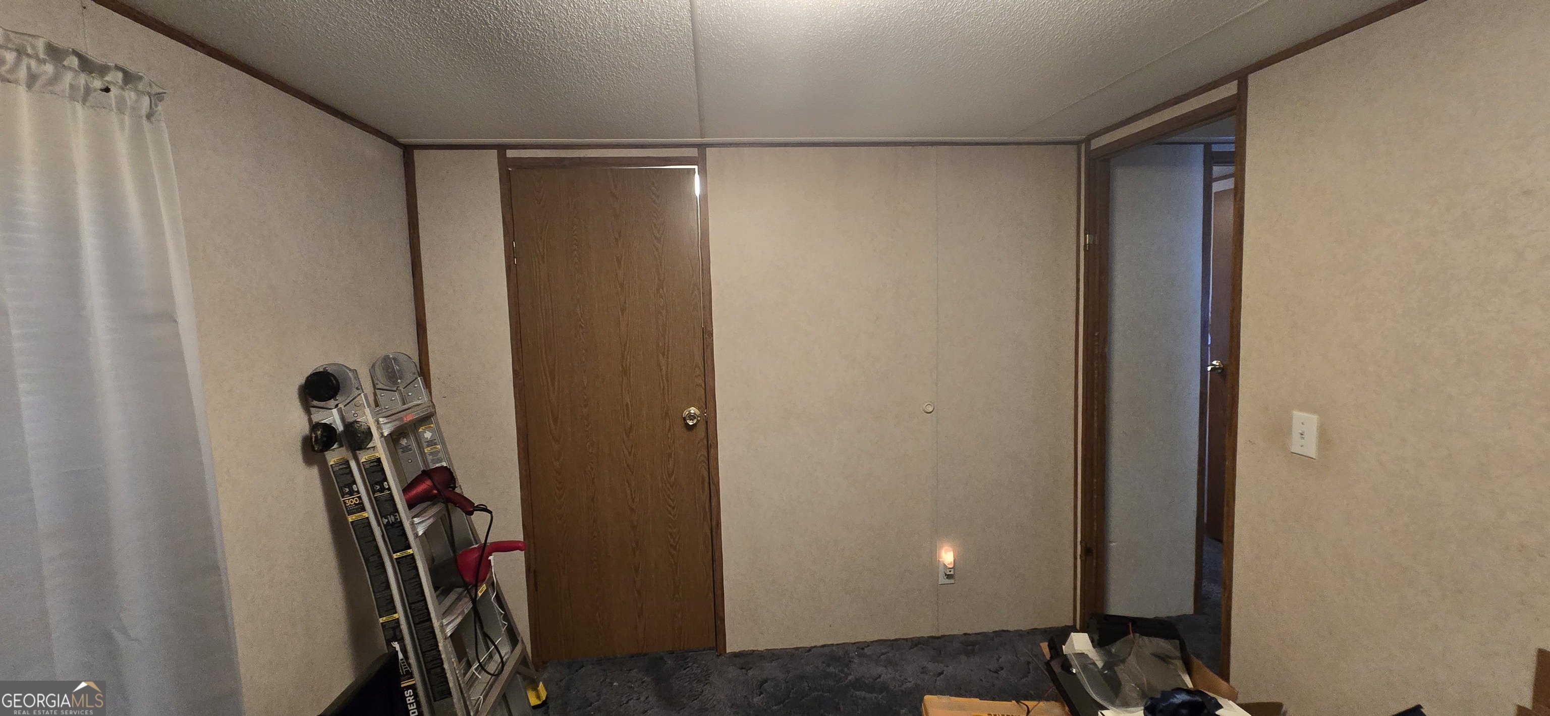 912 Druid Street Dublin, GA 31021 - Photo 30 of 32 a view of a room with gym equipment