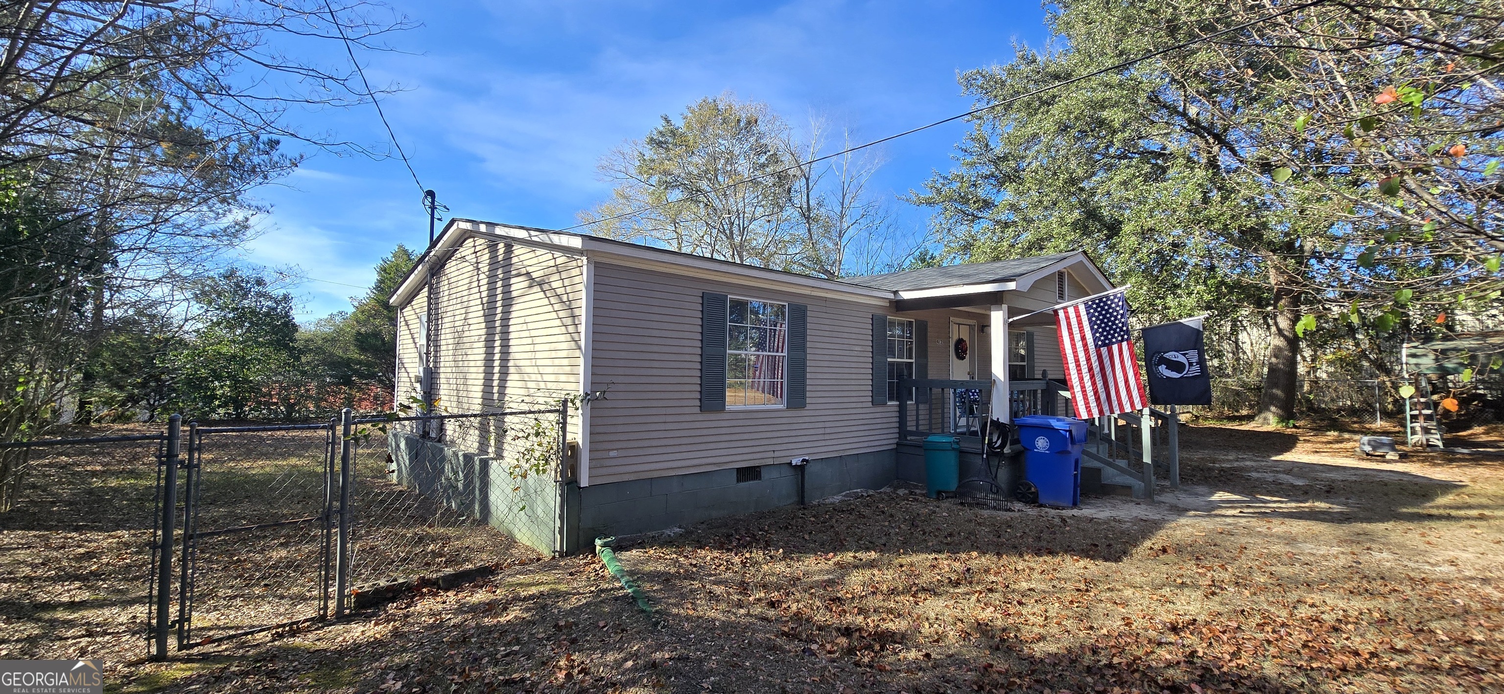 912 Druid Street Dublin, GA 31021 - Photo 9 of 32 a front view of a house with a tree