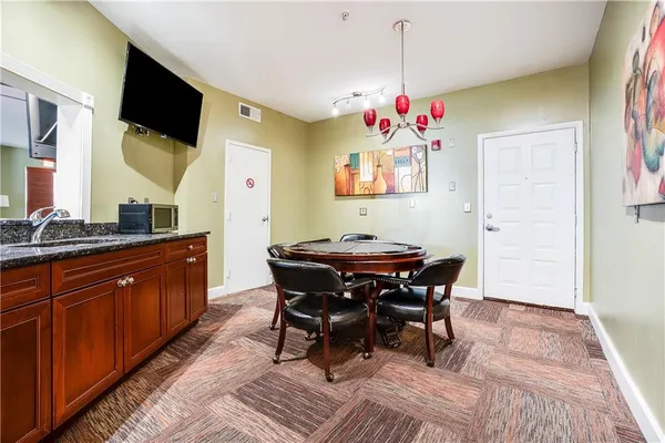 a view of a livingroom with furniture and window