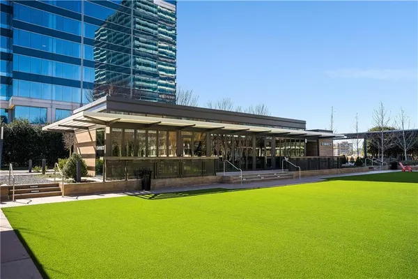 a view of a swimming pool with a patio