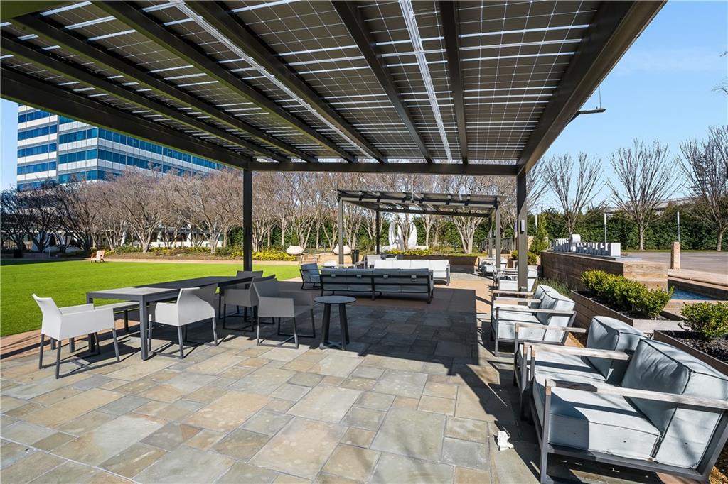 10 Perimeter Summit Boulevard, Unit 4113 Brookhaven, GA 30319 - Photo 43 of 53 a view of a swimming pool and outdoor seating