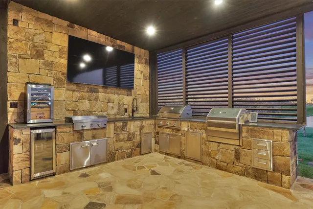 a kitchen with sink cabinets and window