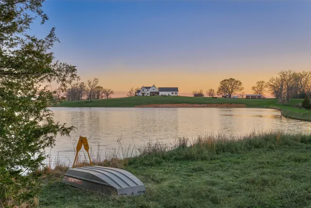 a lake view with a garden
