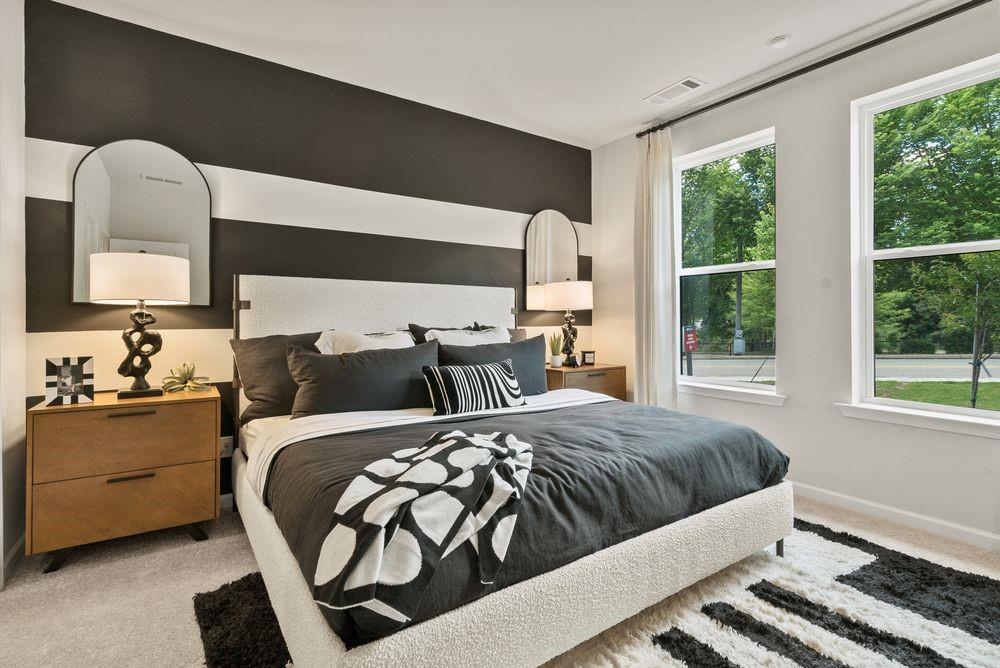 36 Peeples Drive Lawrenceville, GA 30046 - Photo 18 of 30 a bedroom with a bed and window