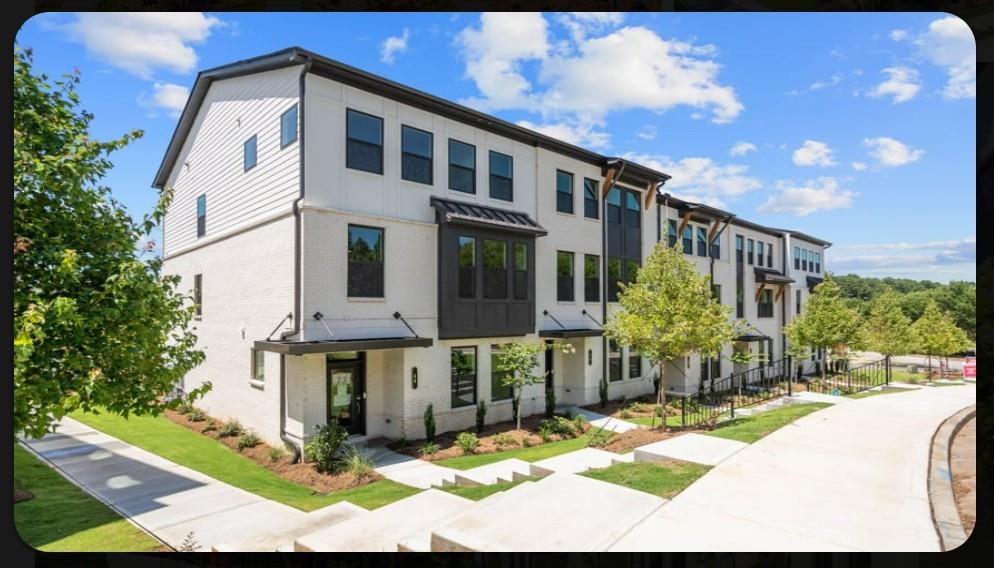 36 Peeples Drive Lawrenceville, GA 30046 - Photo 2 of 30 a view of a house with yard and sitting area