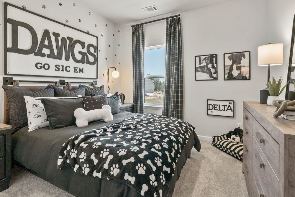 36 Peeples Drive Lawrenceville, GA 30046 - Photo 28 of 30 a bedroom with a large bed and a window