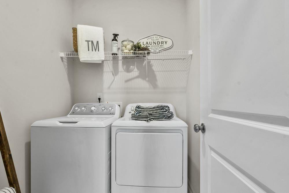 36 Peeples Drive Lawrenceville, GA 30046 - Photo 10 of 30 a view of storage and utility room with washer and dryer