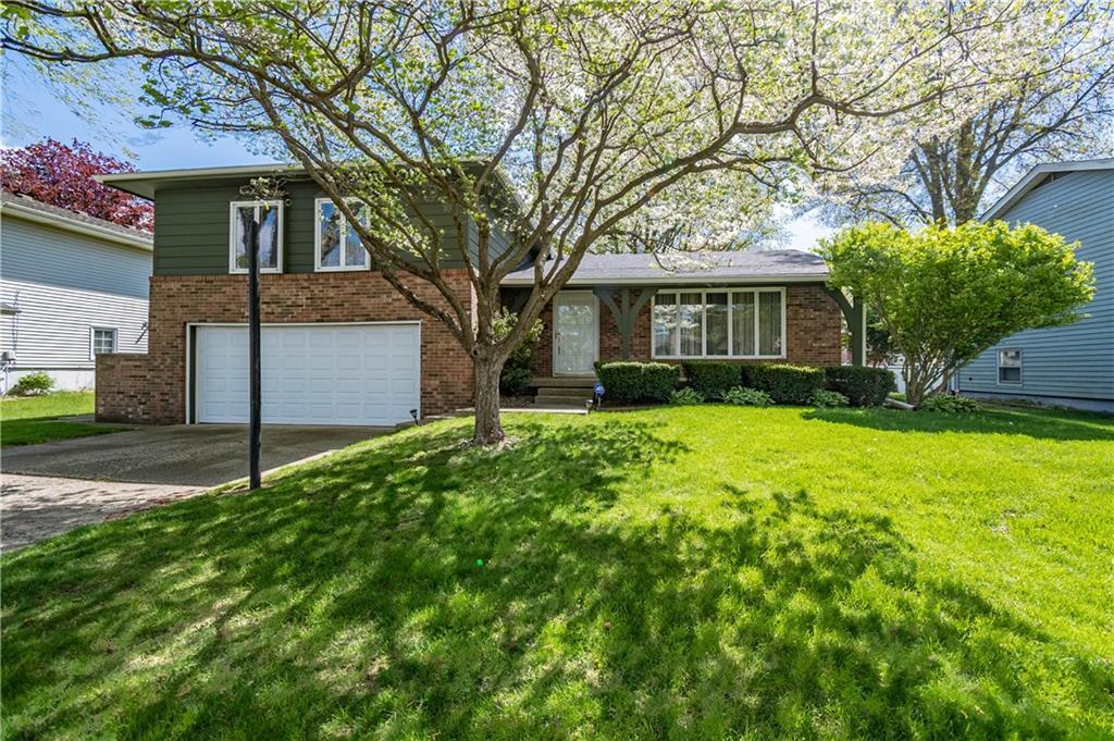 4492 North Adams Drive Decatur, IL 62526 - Photo 1 of 1 a view of a house with a yard