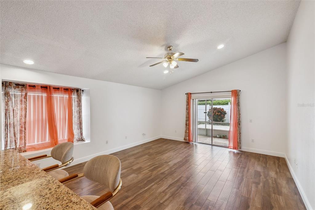 2732 Cahill Way Lake Mary, FL 32746 - Photo 20 of 20 an empty room with windows and ceiling fan