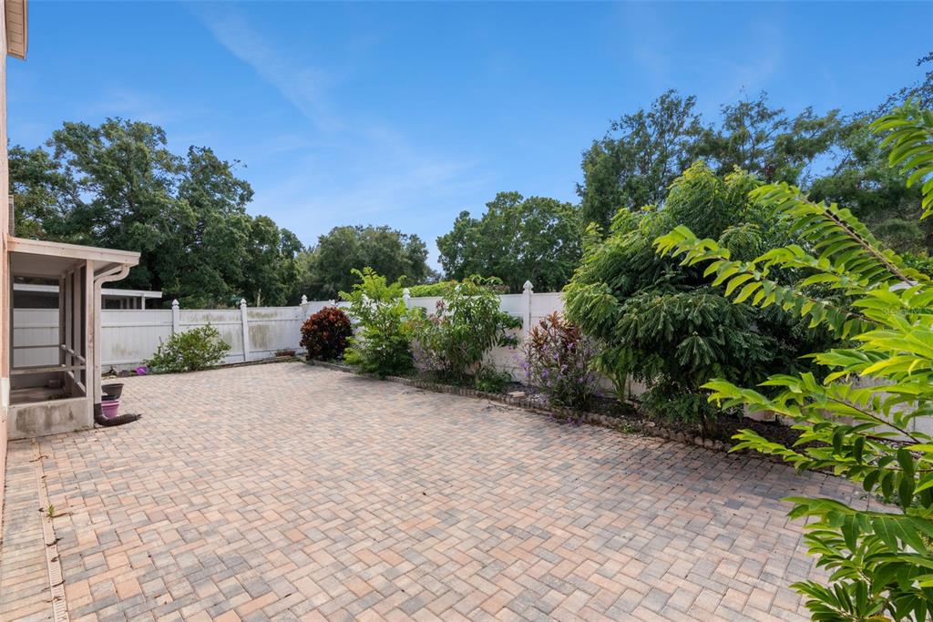 2732 Cahill Way Lake Mary, FL 32746 - Photo 8 of 20 a view of backyard with plants and trees