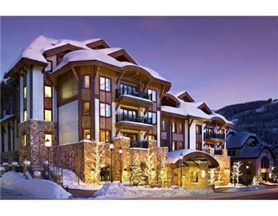 16 Vail Road, Unit 225A Vail, CO 81657 - Photo 1 of 6 a front view of a residential apartment building with a yard