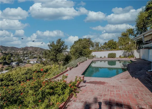 a outdoor living space with furniture and garden view