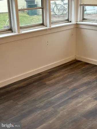 a view of a window in an empty room
