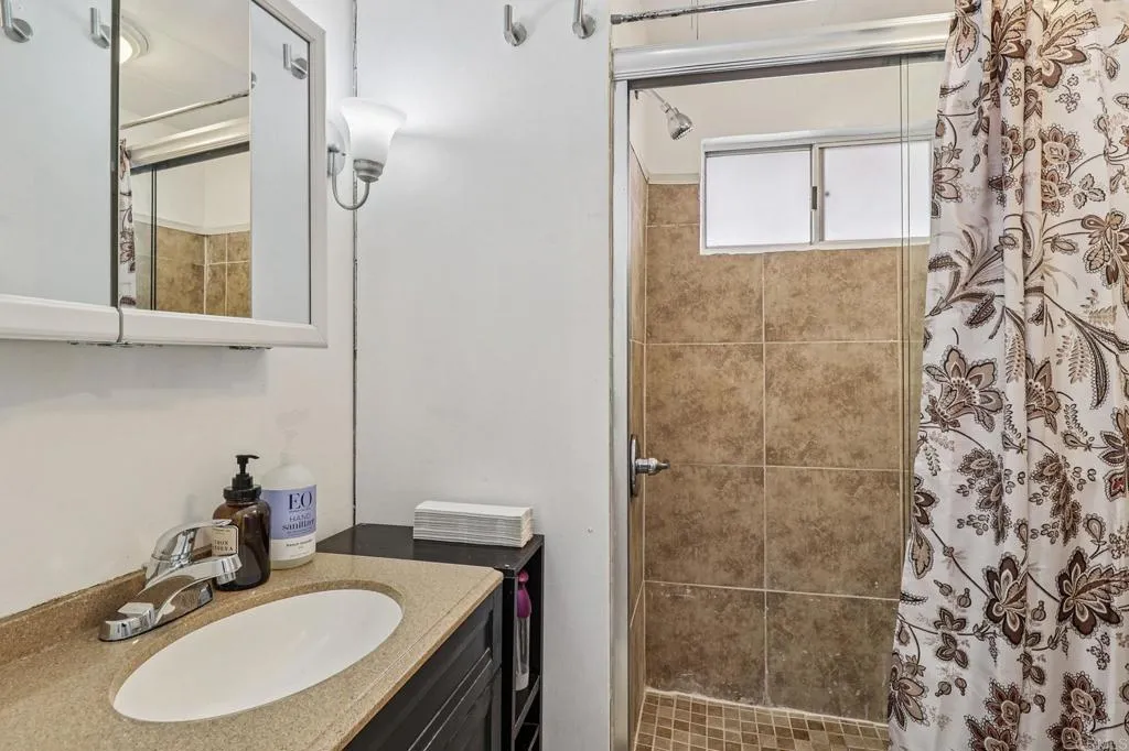 10767 Jamacha Spring Valley, Unit 217 Spring Valley, CA 91978 - Photo 11 of 24 a bathroom with a sink and a mirror
