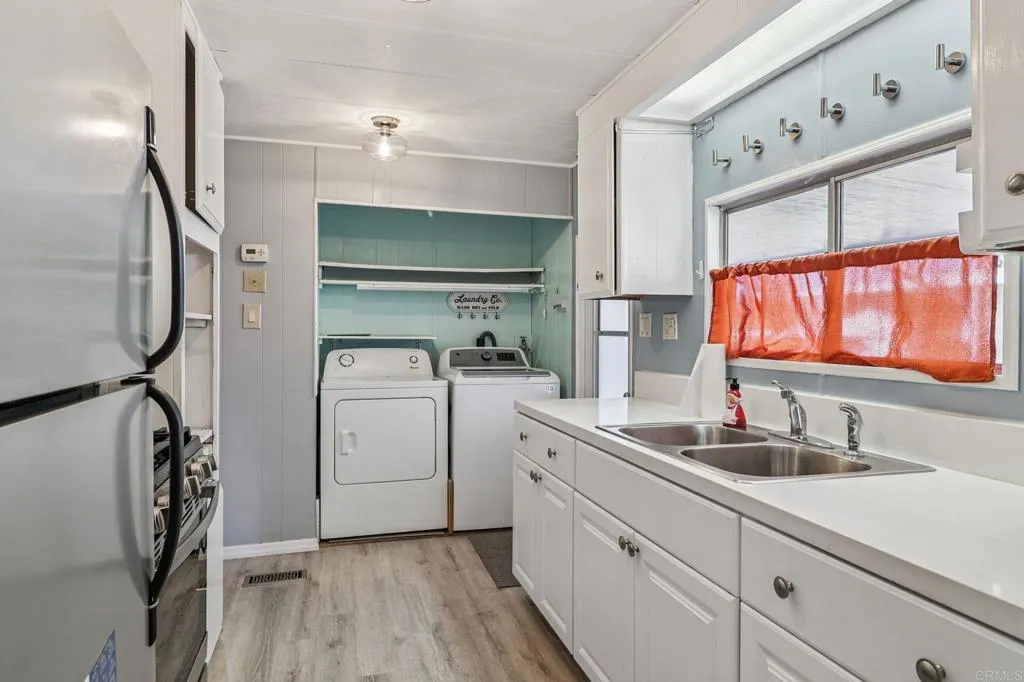 10767 Jamacha Spring Valley, Unit 217 Spring Valley, CA 91978 - Photo 6 of 24 a bathroom with a sink and a mirror