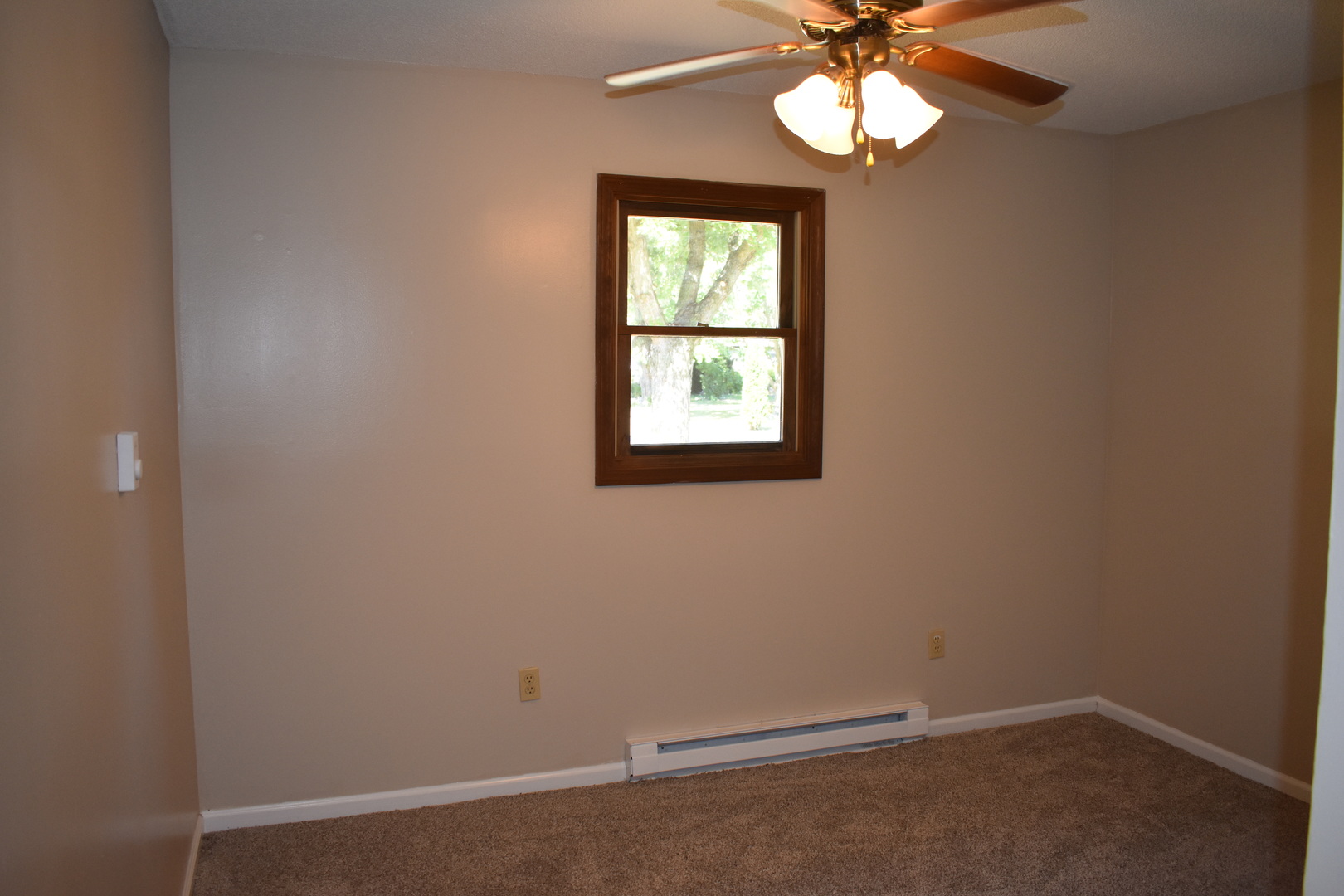 320 North Walnut Street Arcola, IL 61910 - Photo 11 of 14 an empty room with a window