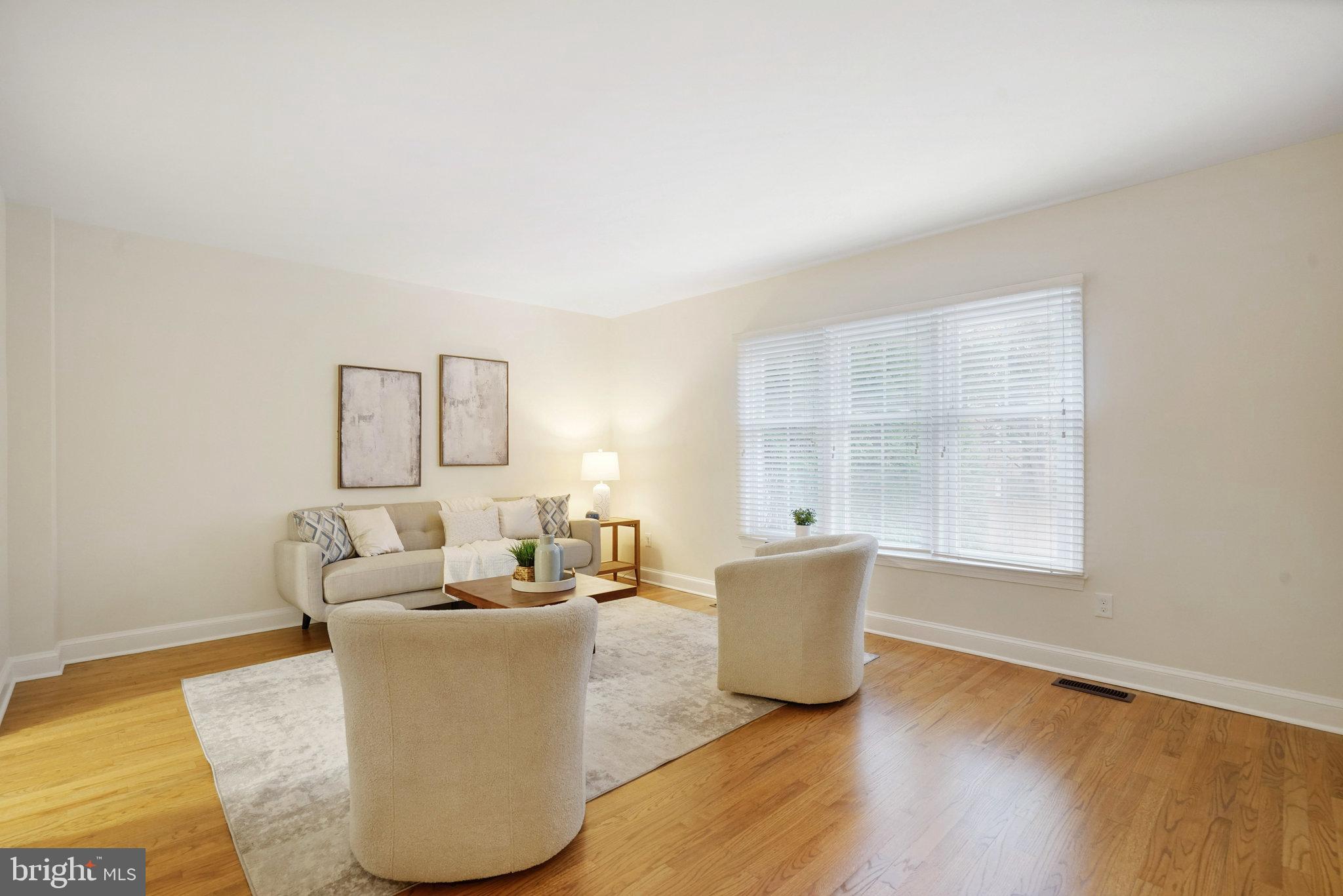 3135 14th Street South Arlington, VA 22204 - Photo 20 of 53 a living room with couches and painted walls with wooden floor