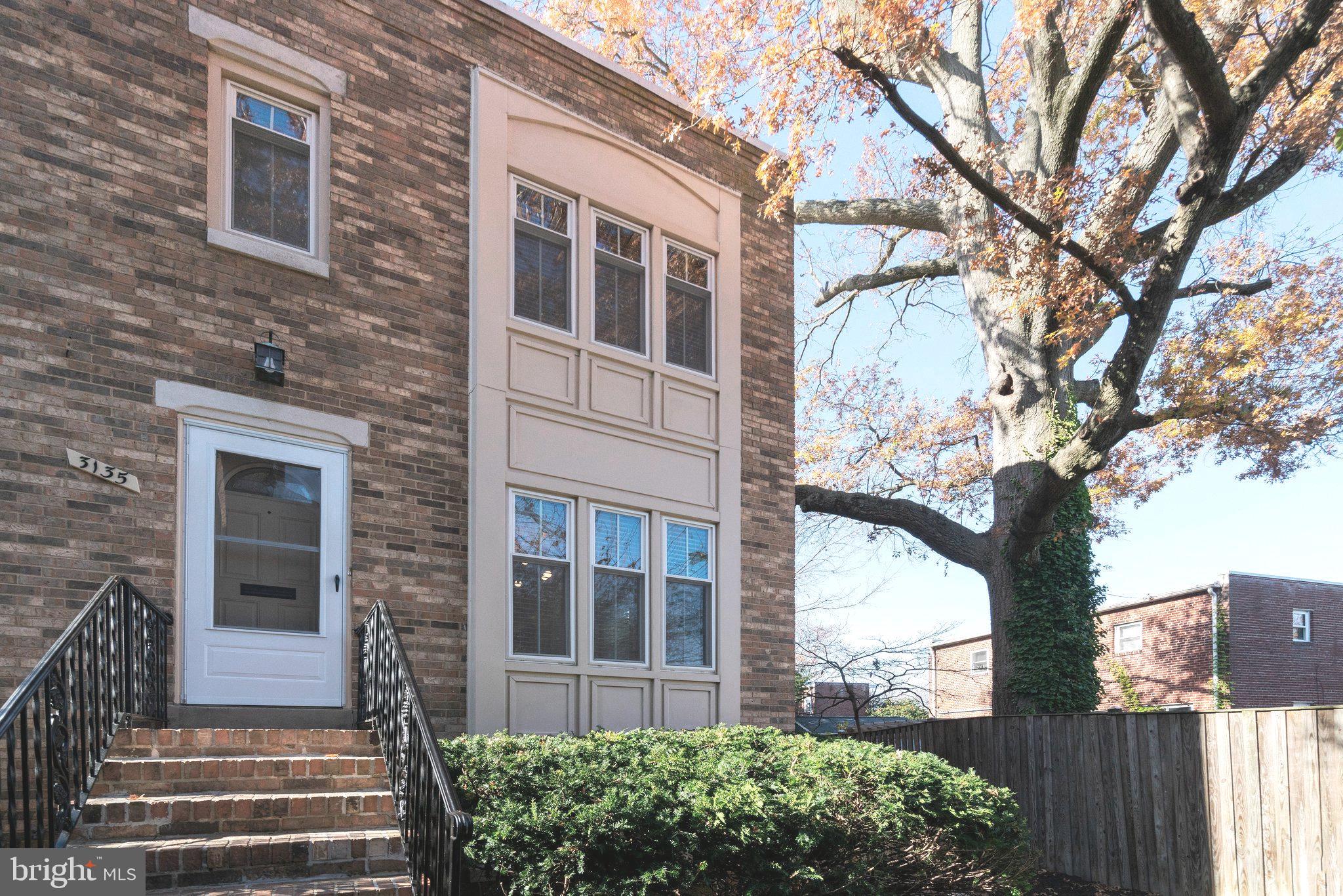 3135 14th Street South Arlington, VA 22204 - Photo 2 of 53 a view of a house with a yard and a large tree