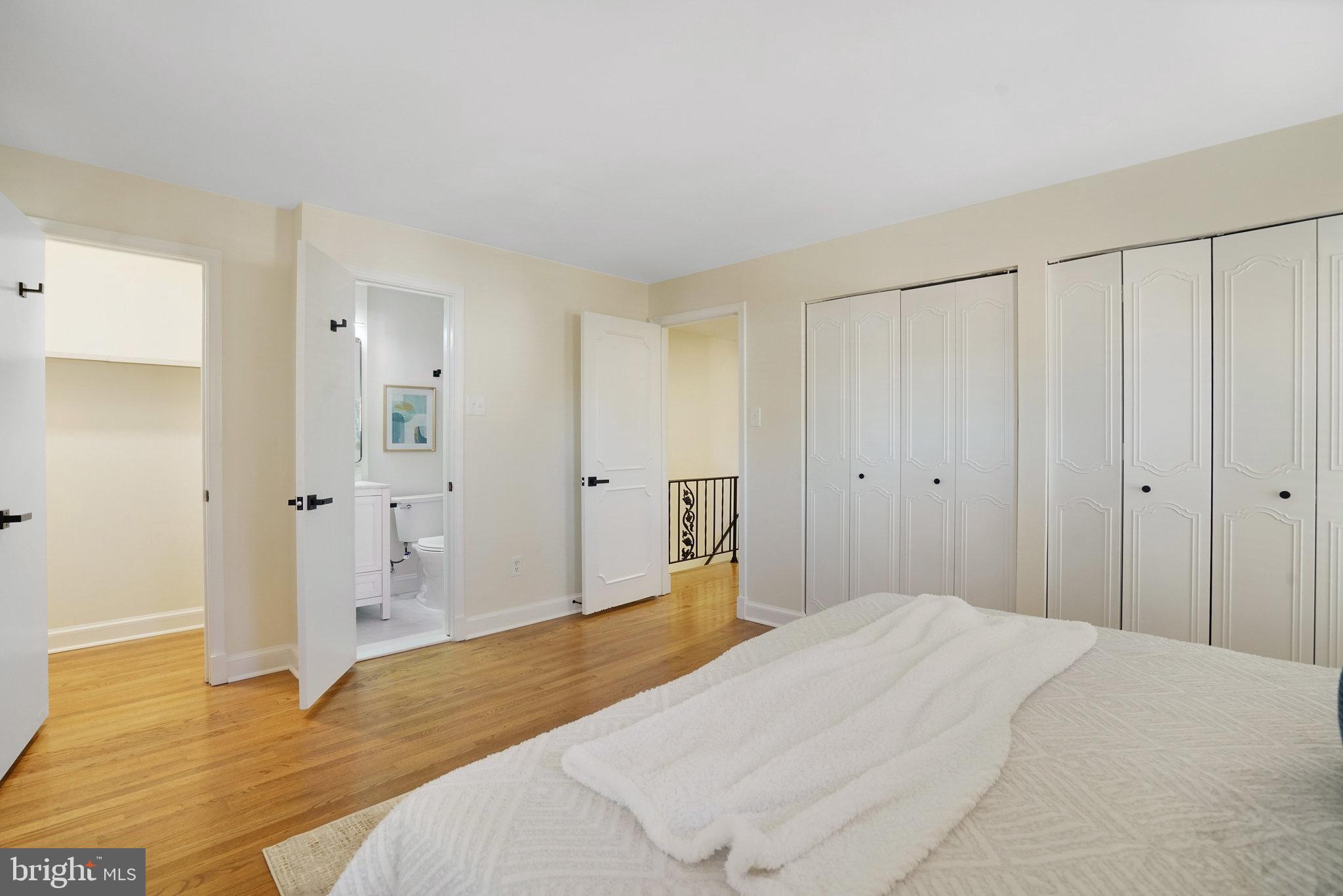 3135 14th Street South Arlington, VA 22204 - Photo 26 of 53 a bedroom with a bed and wooden floor