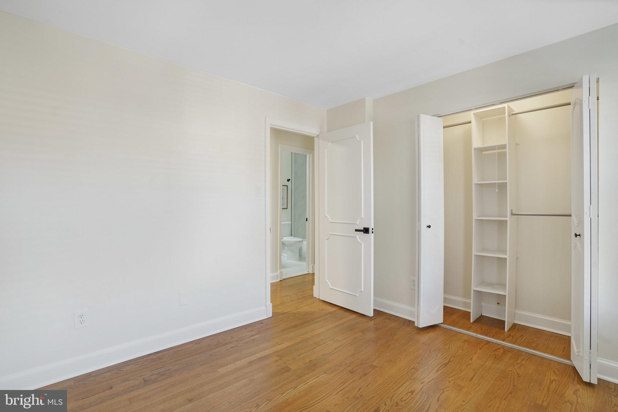 3135 14th Street South Arlington, VA 22204 - Photo 35 of 53 a view of an empty room with wooden floor and closet