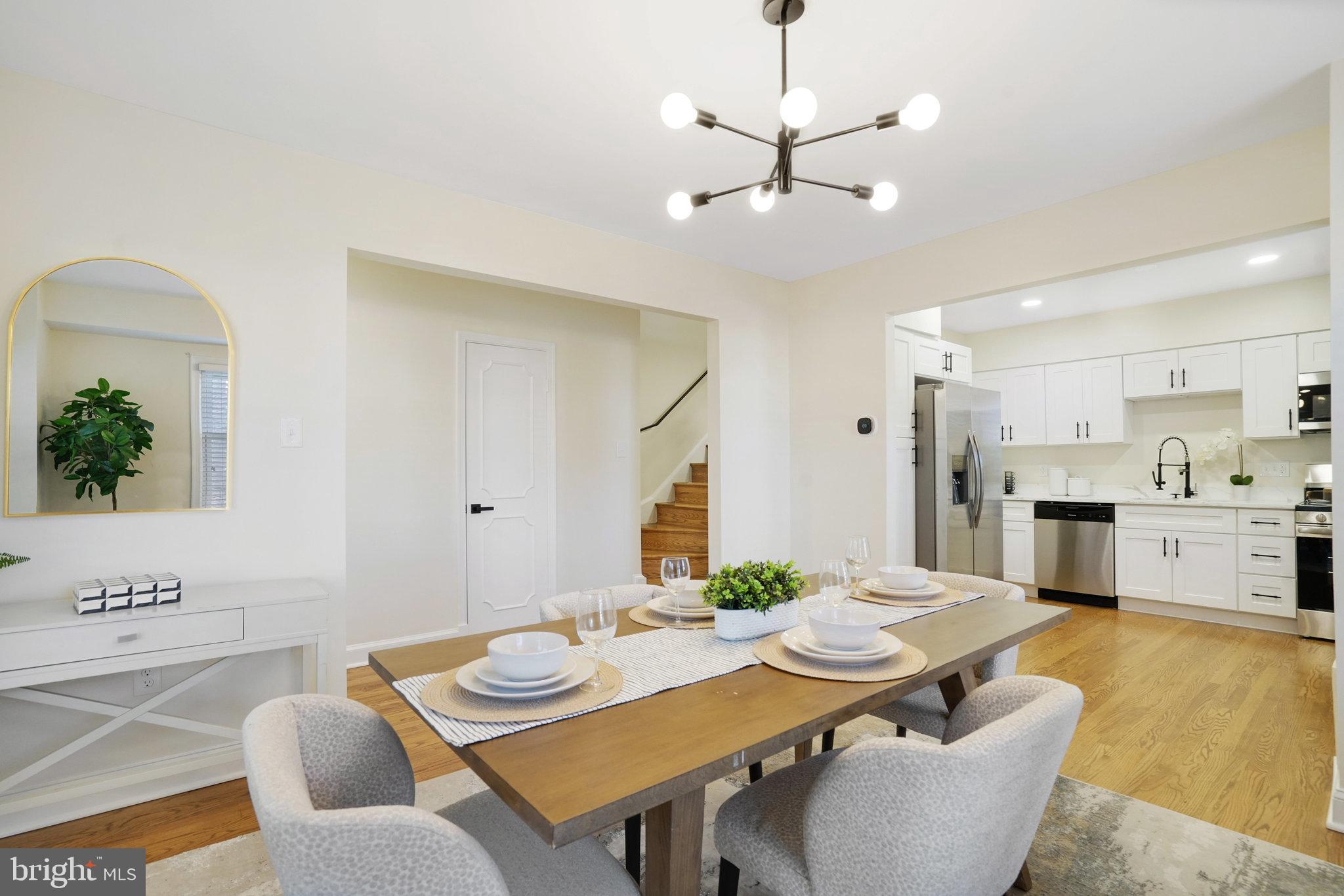 3135 14th Street South Arlington, VA 22204 - Photo 9 of 53 a view of a dining room with furniture and wooden floor