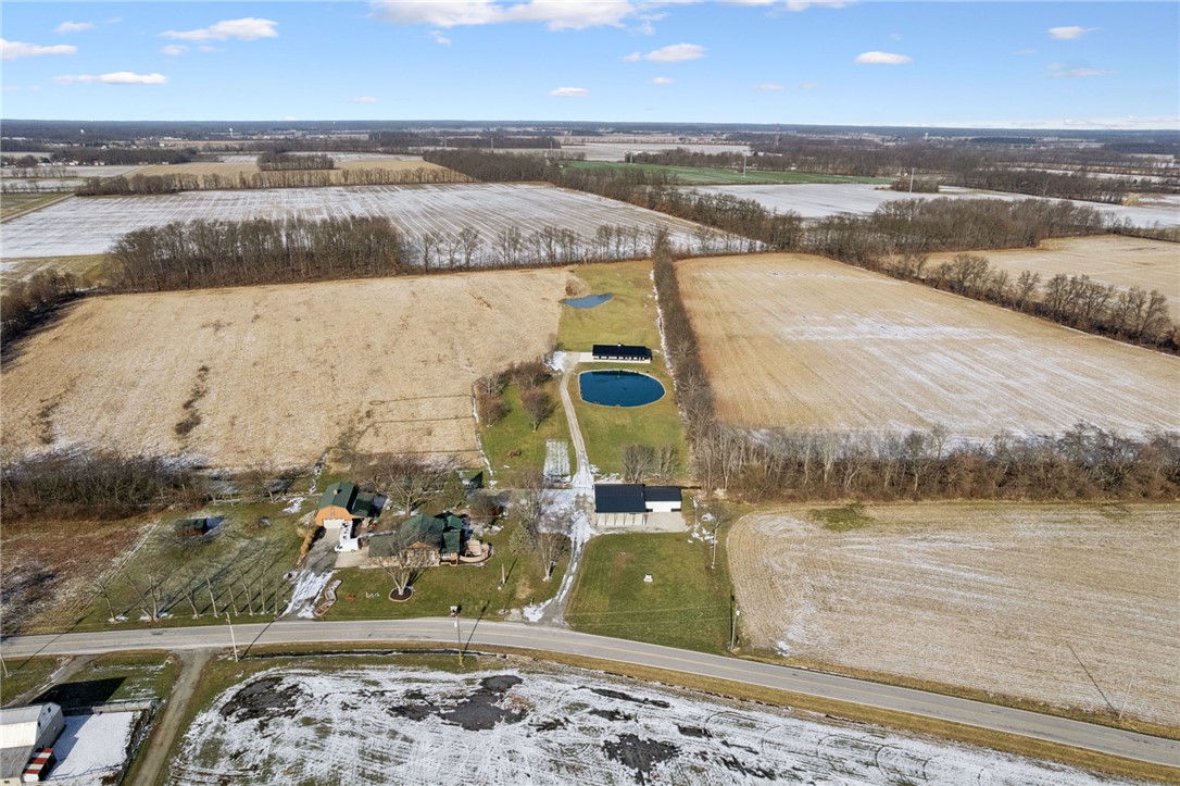 1602 Westboro Road Blanchester, OH 45107 - Photo 47 of 81 This expansive aerial view showcases a picturesque rural property with serene ponds.