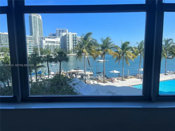 a view of a balcony with lake view and a ocean view