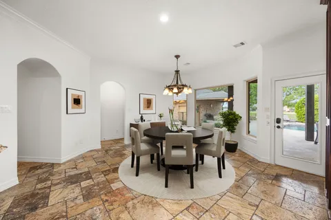 a view of a dining room with furniture
