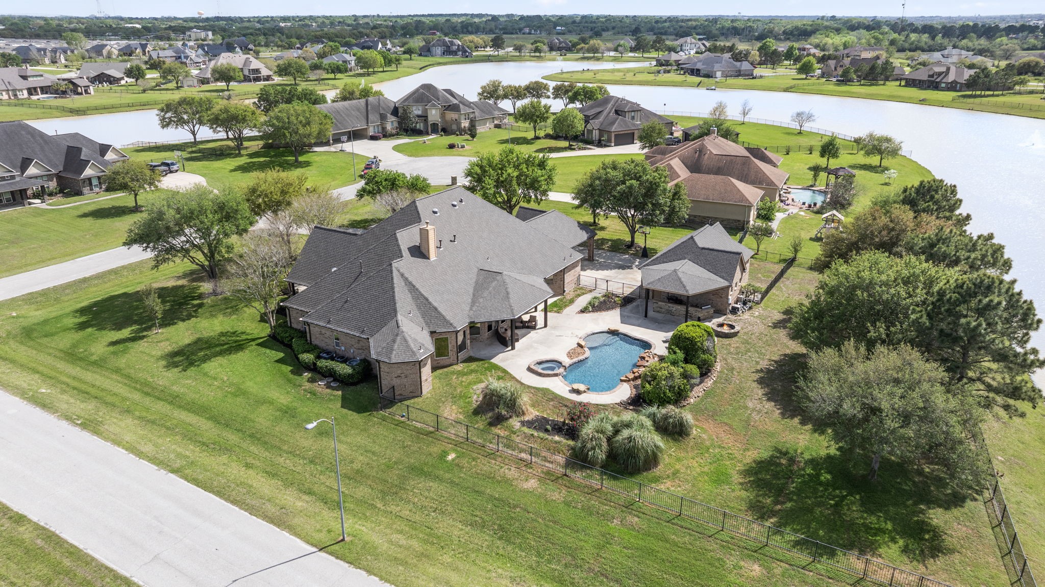 4611 Oasis Point Katy, TX 77493 - Photo 2 of 41 Welcome Home! If spacious home sites, high quality construction, and lakeside living are on your "must haves" list...look no further! 6 bedrooms, 4 full baths, a 3-car gargage and porte cochere parking for 2 additional vehincles.