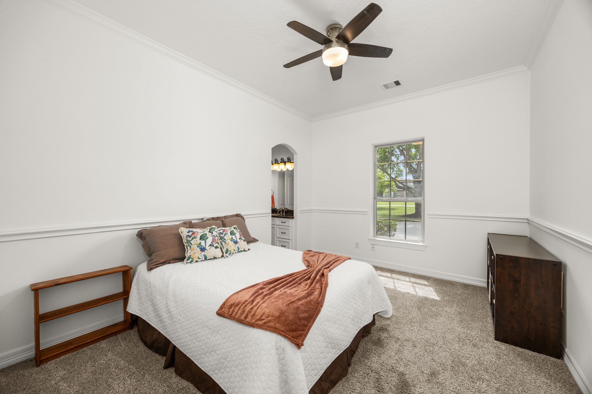 4611 Oasis Point Katy, TX 77493 - Photo 25 of 41 Bedroom 4 overlooks the side of the home. All secondary bedroom are proportioned to fit a suite of Queen-sized furniture.