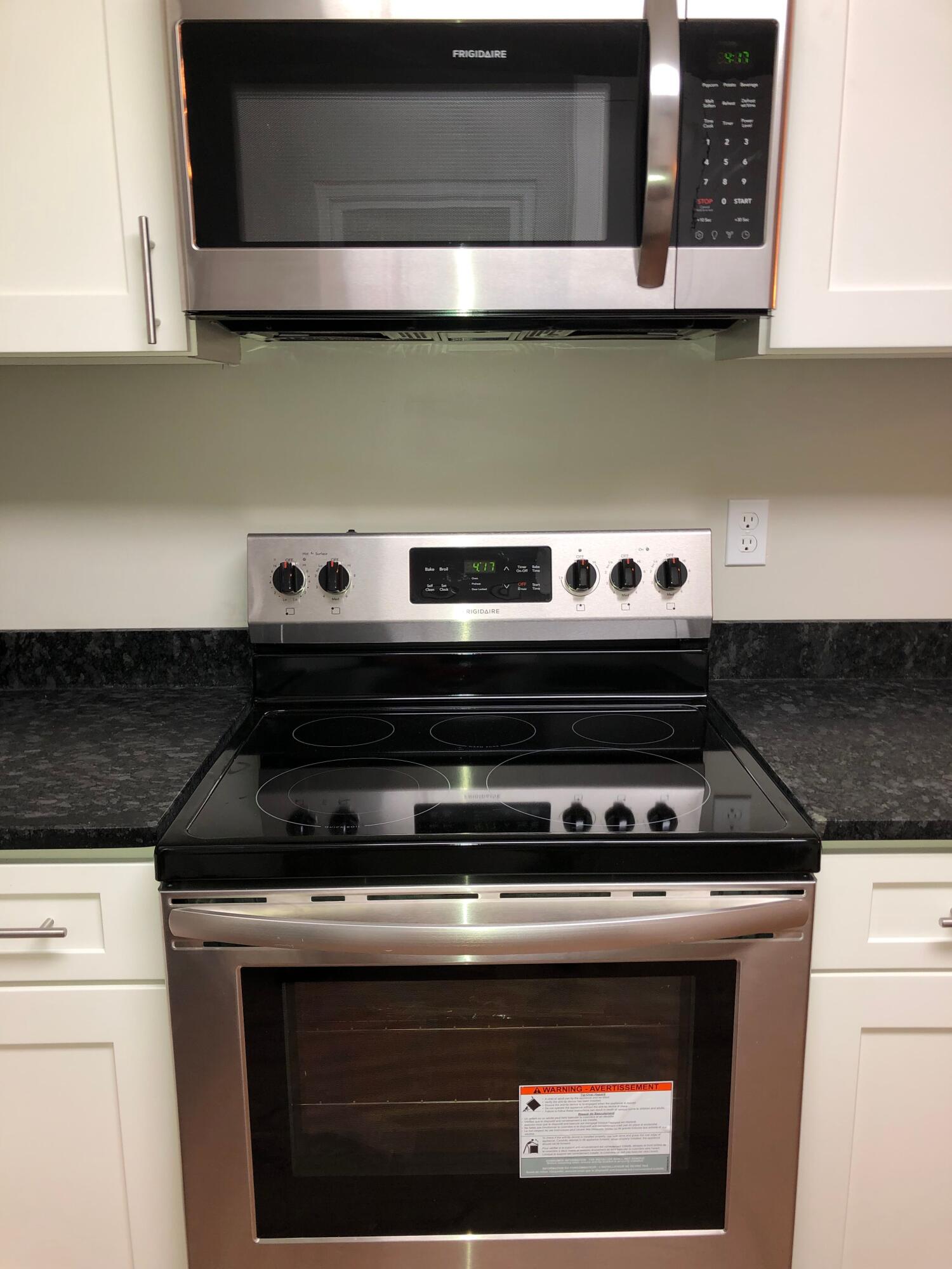 8735 Hidden Branches Road Harrison, TN 37341 - Photo 10 of 27 Hidden Branches stove and microwave