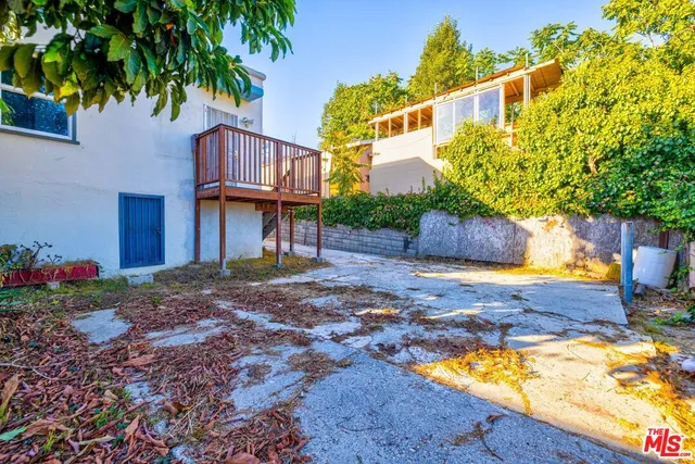 a view of a balcony with chairs