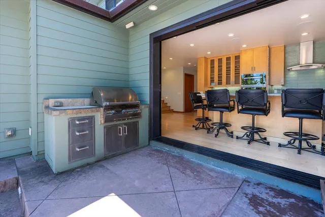 a view of a kitchen with appliances and cabinets
