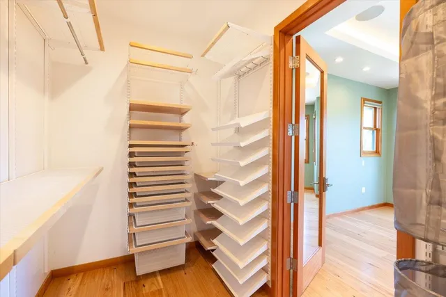 a view of bathroom with a shower and a tub