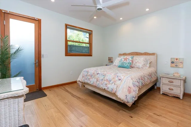 a bedroom with a bed and a couch