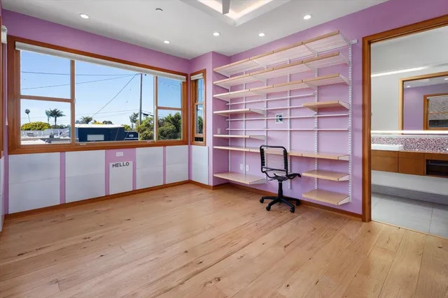a view of a livingroom with furniture and a window