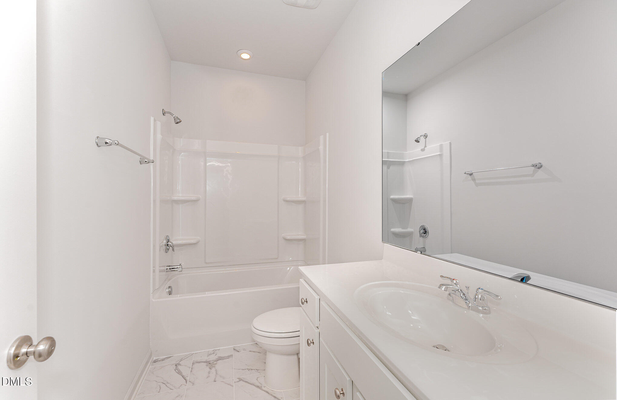 146 Starlet Ridge Way Clayton, NC 27520 - Photo 11 of 18 a bathroom with a sink toilet and shower