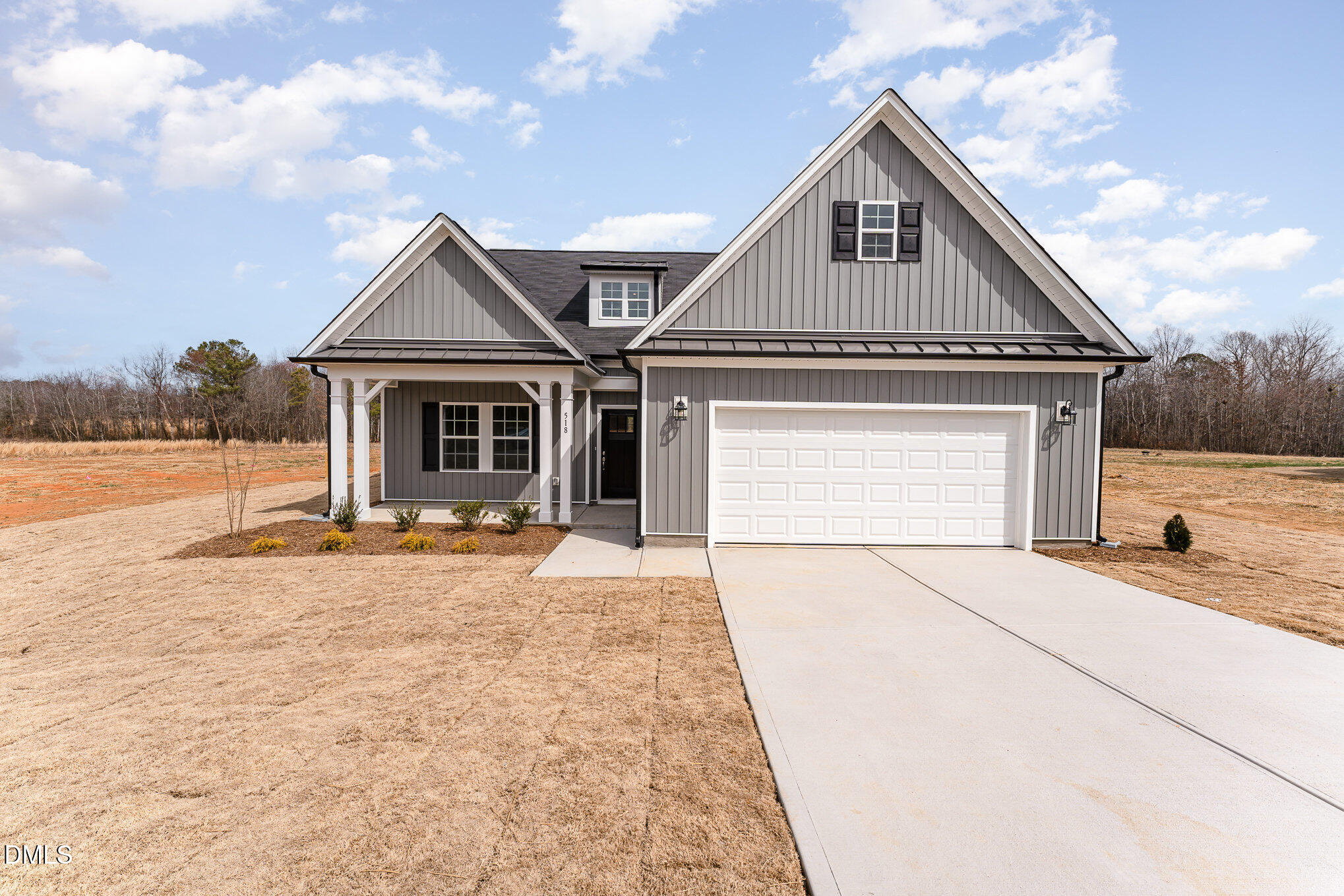 146 Starlet Ridge Way Clayton, NC 27520 - Photo 2 of 18 a front view of a house with yard