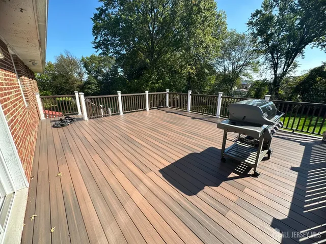 a white toilet sitting next to a bath tub shower