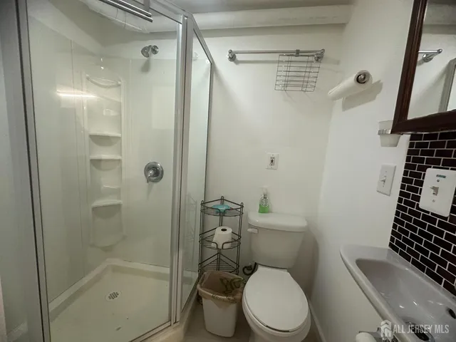 a close view of shoes stand and cabinets