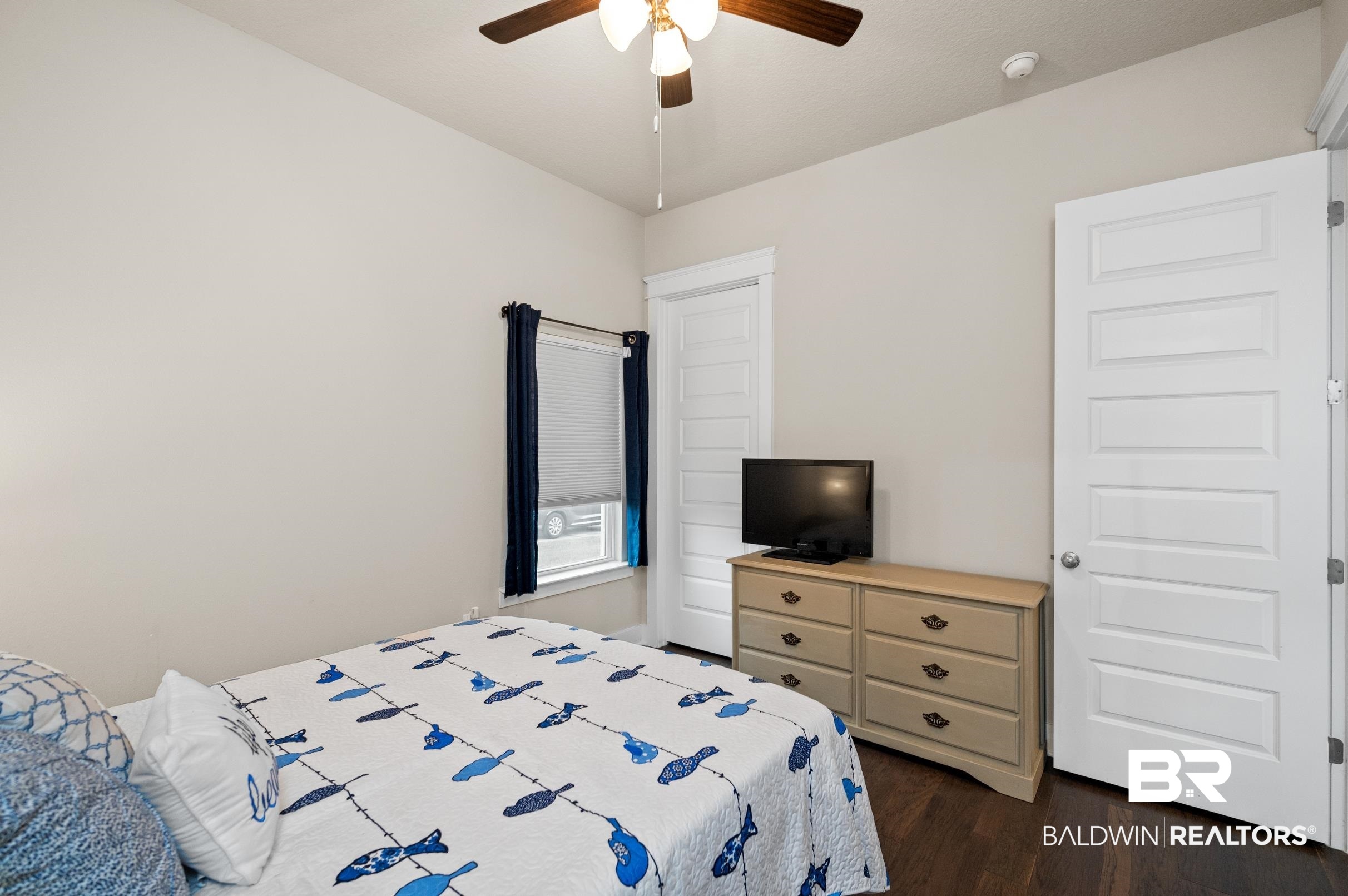 31355 Limpkin Street Daphne, AL 36527 - Photo 41 of 57 Bedroom with ceiling fan and dark hardwood / wood-style floors