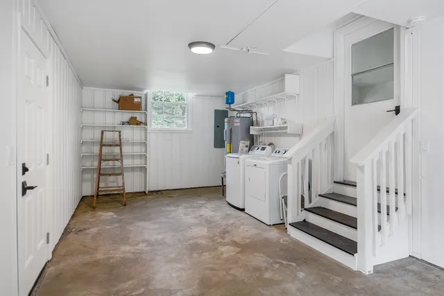 a view of a storage & utility room with racks on the wall