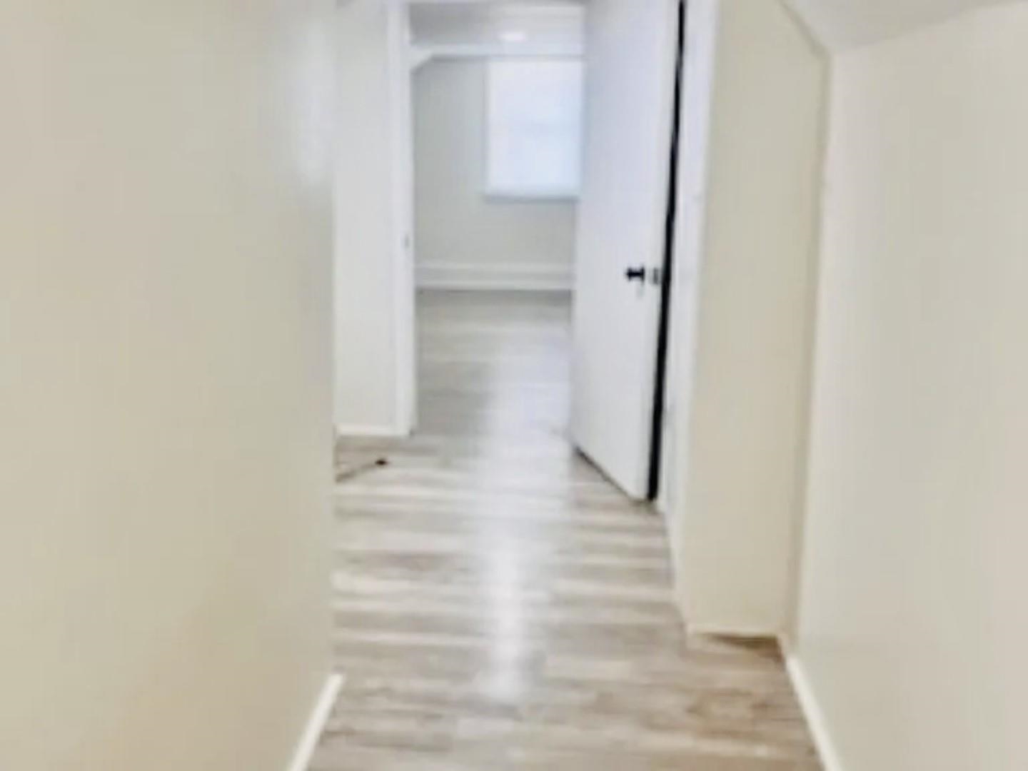3442 Carrington Road Memphis, TN 38111 - Photo 21 of 25 Corridor featuring light wood-type flooring and baseboards