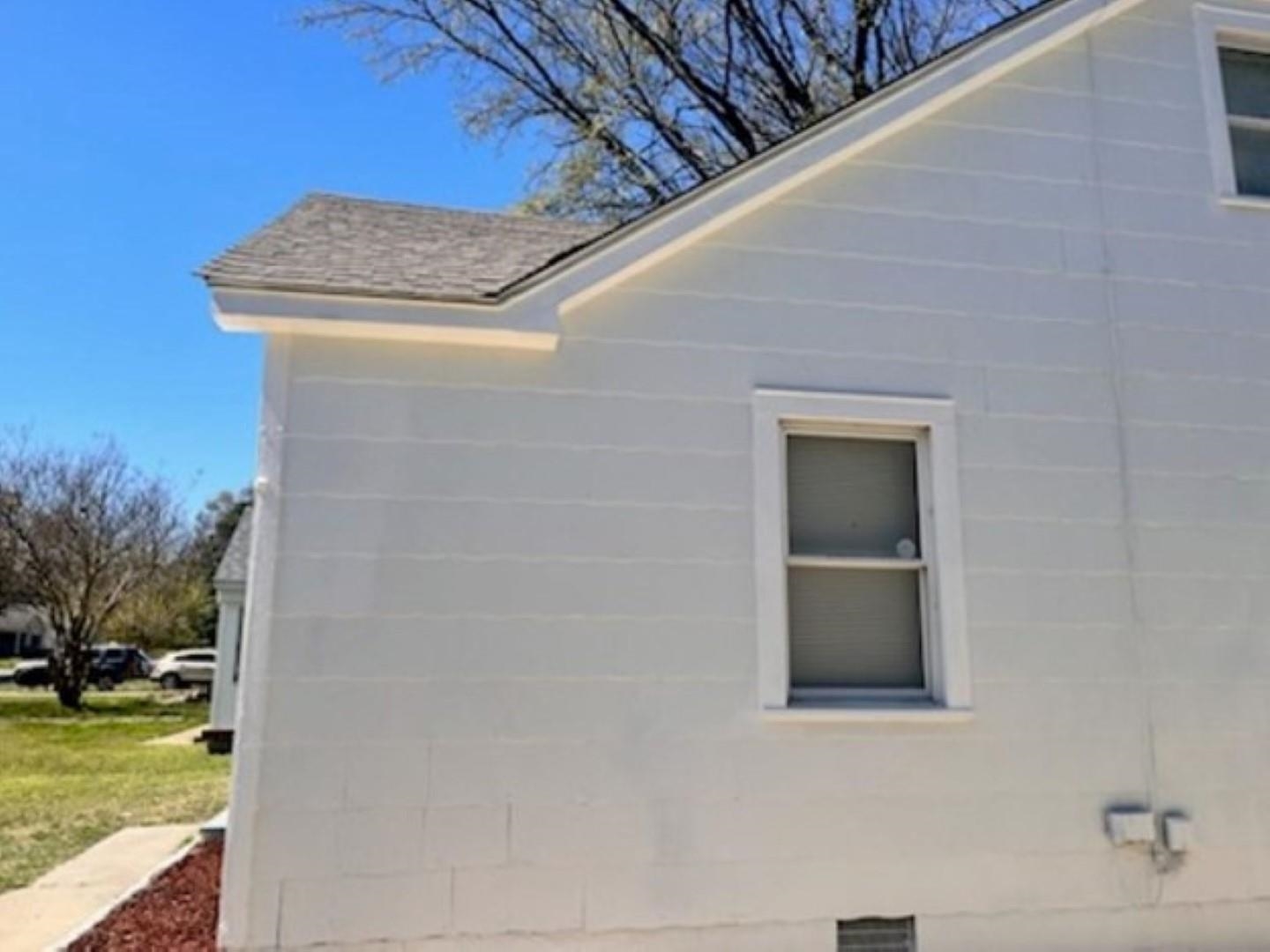 3442 Carrington Road Memphis, TN 38111 - Photo 24 of 25 View of side of property with roof with shingles