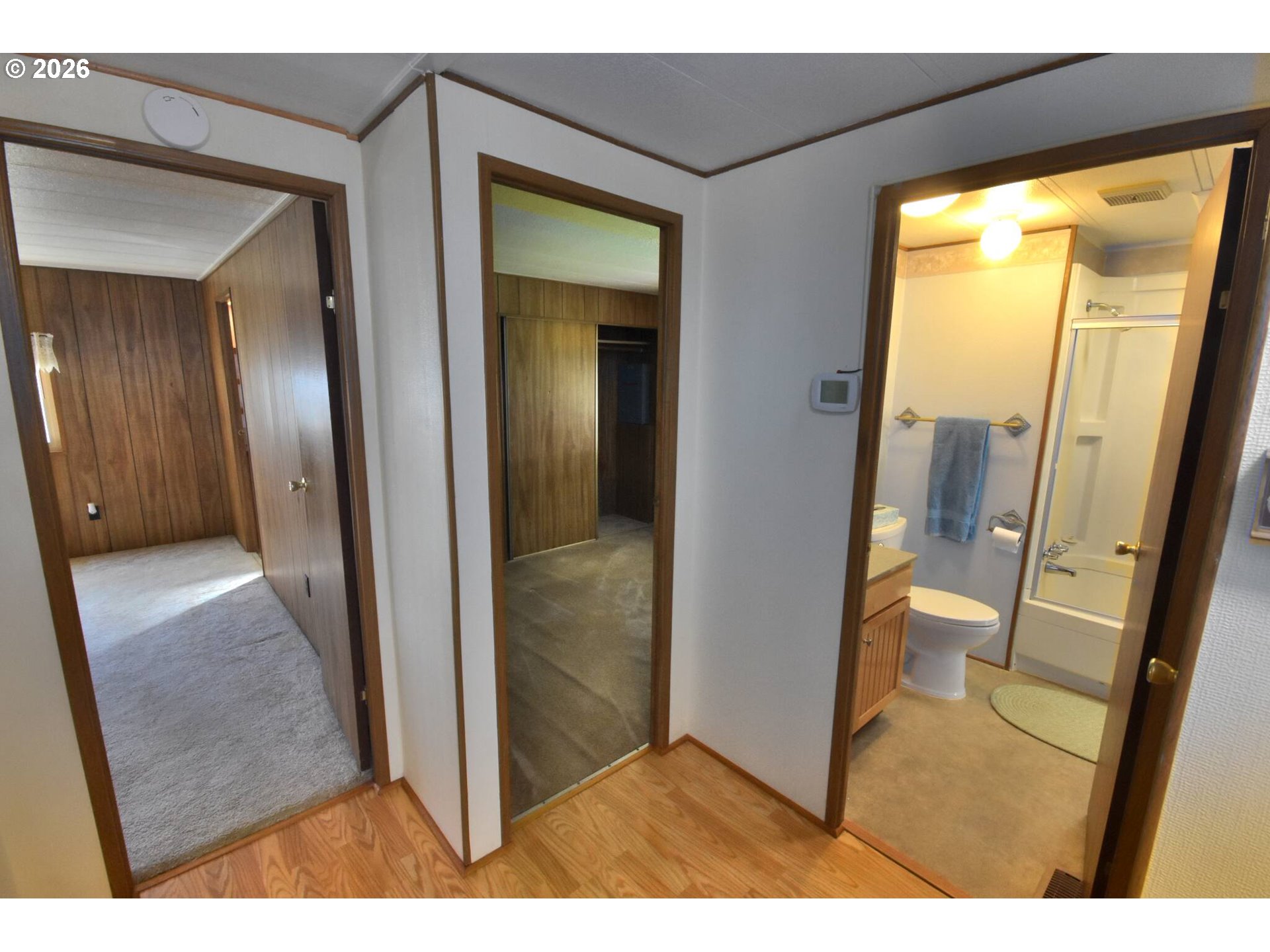 569 South 51st Place Springfield, OR 97478 - Photo 18 of 40 a view of a bathroom from a corridor